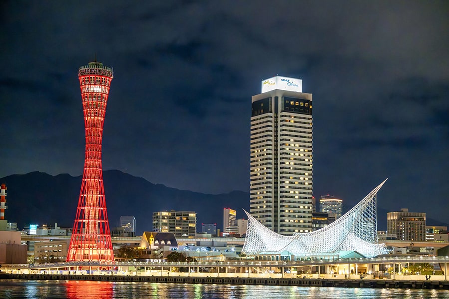 The owner of Yakitori Isao grilling skewers over charcoal at his restaurant